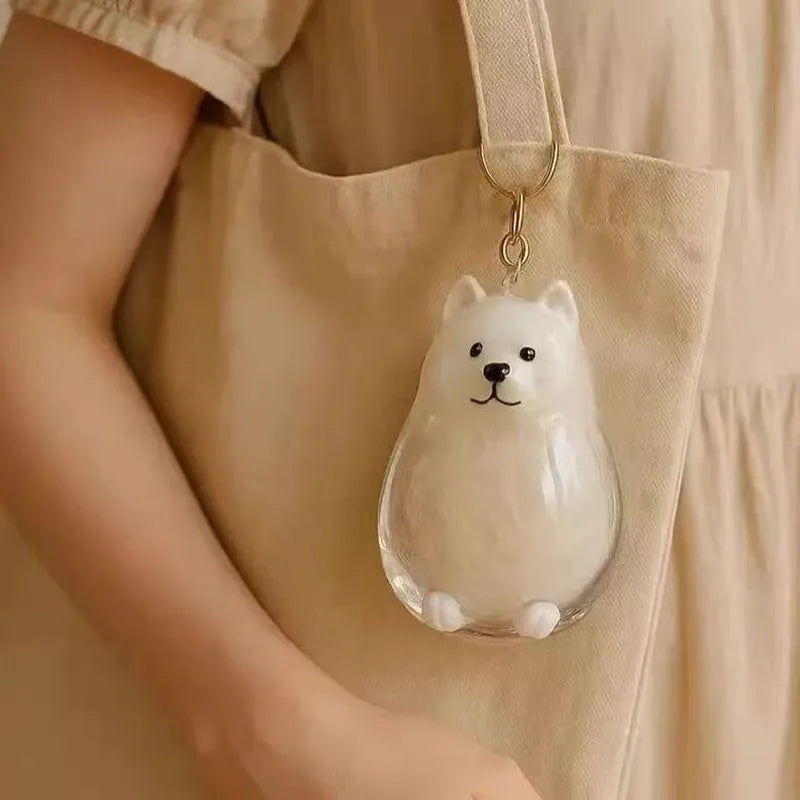 clear keychain with collectible pendant.